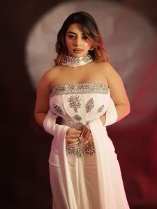 Ankita Dave's glamorous avatar in a white off-shoulder gown