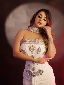 Ankita Dave's glamorous avatar in a white off-shoulder gown