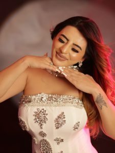 Ankita Dave's glamorous avatar in a white off-shoulder gown