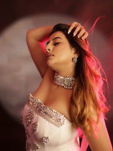 Ankita Dave's glamorous avatar in a white off-shoulder gown