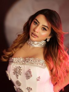 Ankita Dave's glamorous avatar in a white off-shoulder gown