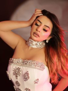 Ankita Dave's glamorous avatar in a white off-shoulder gown