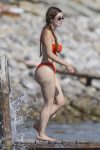 Demi Rose flaunts her famous curves in an orange bikini 9 exclusive ibiza spain demi rose 1099683786