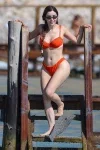 Demi Rose flaunts her famous curves in an orange bikini 10 exclusive ibiza spain demi rose 1099684083