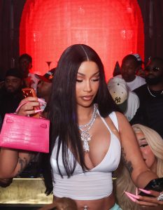 Cardi B turns heads in a plunging white top