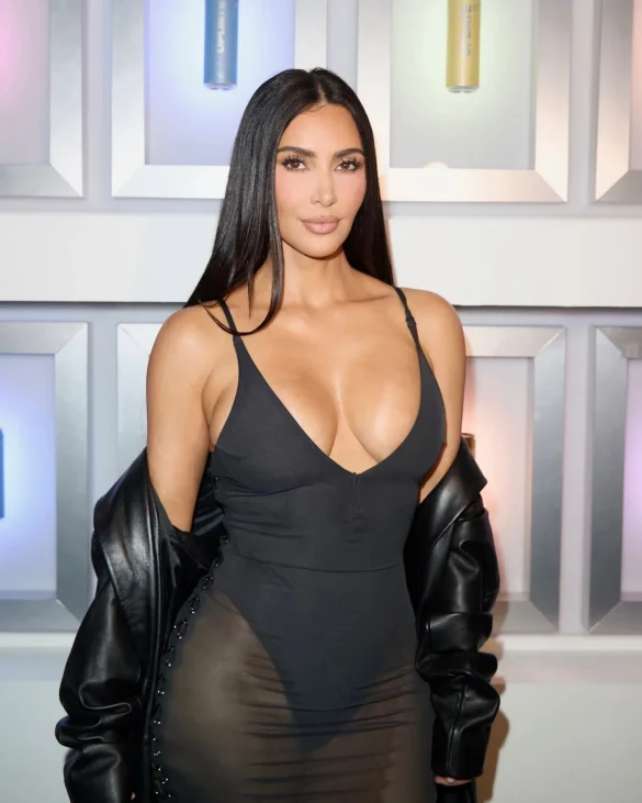 kim kardashian in a sheer black dress and leather coat leaves the update pop up on melrose 0