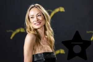 Olivia Wilde Wears a Strapless Peplum Top at The Invite Photocall
