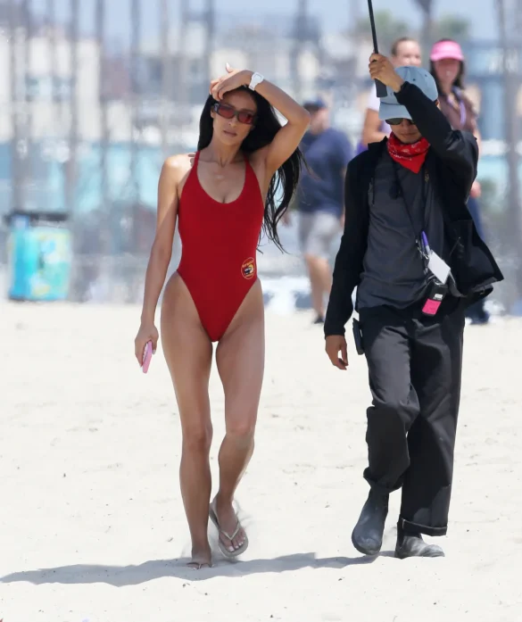 shay mitchell films baywatch in a red swimsuit july 2026 0