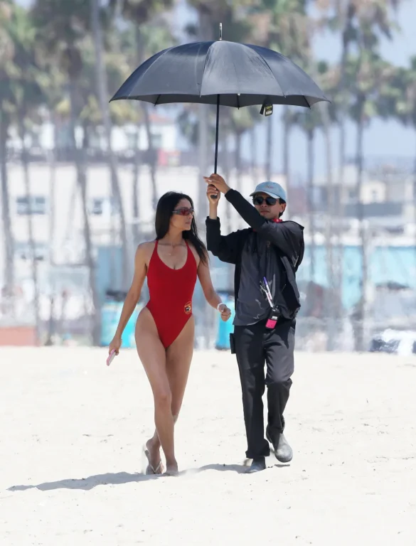 shay mitchell films baywatch in a red swimsuit july 2026 1
