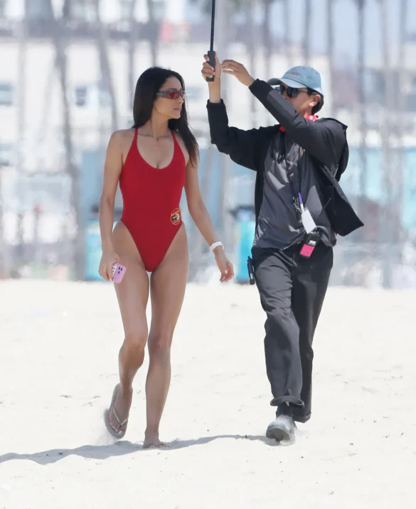 shay mitchell films baywatch in a red swimsuit july 2026 3